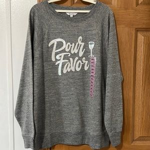 Grey long sleeve size small but is more like a large